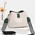 White bucket bag in lychee leather with dark green accent and chevron strap - White & Green
