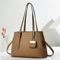 Brown crocodile embossed tote bag with adjustable shoulder strap and metal lock charm - Brown