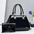 Black patent leather tote bag and clutch set with gold shell detail and polished finish - 2-Piece Set (Handbag + Envelope Bag) / Black