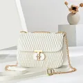 White quilted matelassé crossbody bag with gold chain strap and T-lock closure - Off-White T-Lock Style