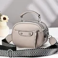 Three-layer faux leather crossbody bag in beige with wide herringbone canvas strap - Light Gray