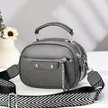 Grey faux leather crossbody bag with three zipper compartments and wide woven strap - Dark Gray