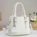 Elegant white lychee pattern tote bag with silver hardware and mini pendant charm - 25cmx20cmx11cm / Off White