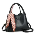 Classic black bucket bag with lychee texture, HSJ embossed logo, and plaid scarf handle - Black