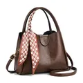 Deep brown retro bucket bag with oily leather texture and checkered heart silk scarf decoration - Coffee