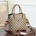 Retro geometric print bucket bag in brown faux leather with a wide crossbody strap - Style 1
