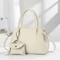 Elegant cream leather tote bag set with crossbody strap and small envelope pouch charm - Off White