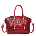 Luxurious dark red crocodile embossed tote bag with gold hardware and top handles - Red
