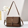 Brown litchi grain leather crossbody bag with elegant gold buckle and shoulder strap - Style 2 (Interlocking Square Buckle) / Brown