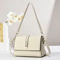 Minimalist beige crossbody bag with lychee grain texture and gold metal hardware - Style 1 (U-Shaped Buckle) / Off White