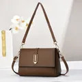 Minimalist dark brown lychee pattern leather handbag with elegant gold metal hardware - Style 1 (U-Shaped Buckle) / Brown