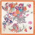 Detail view of the silk scarf featuring colorful floral patterns and orange hem borders - 90cm*90cm / Orange