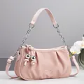 Chic pink woven cloud bag with silver sphere charm and elegant chain shoulder strap - 26cm x 7cm x 15cm / Pink