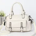 Chic cream leather underarm bag with metal rivets and adjustable shoulder strap - Off White