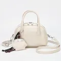 Creamy white vintage style square handbag with star charm and silver dual zippers - Beige