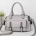 Gray lychee textured Boston bag with top handles and detachable wide woven shoulder strap - Gray