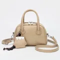 Chic beige square Boston bag in oil leather finish with adjustable shoulder strap - Khaki