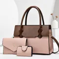 Detailed view of 3-piece woven textured handbag set with dark brown leather handles - Pink