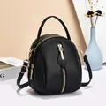 Chic black litchi leather mini crossbody bag with gold zippers and multi-compartment design - 14cmx11cmx18cm / Black