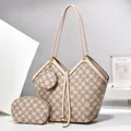 Detailed set view of a tote bag with matching cosmetic pouch and round charm pendant - Off White