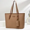 Brown woven tote bag with adjustable strap and coin purse against a minimalist white background - Dark Khaki