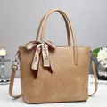 Chic light brown PU tote bag with a decorative silk scarf and adjustable shoulder strap - Khaki
