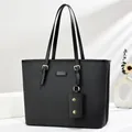 Minimalist black PU leather tote bag with gold hardware and mini charm pouch accessory - Black