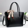 Fashionable black PU leather tote bag with elegant silk scarf and adjustable shoulder strap - Black