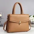 2025 trendy solid camel leather tote bag with lychee texture and gold twist lock clasp - Khaki