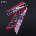 Detail of blue and lavender geometric silk scarf with red edges on black background - Red Border Blue Base Buckle Pattern (C73-5)