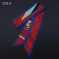 Close-up of geometric pattern silk twilly scarf with red and blue scroll motifs - Red Purple Blue Patchwork Vintage Totem (C73-3)