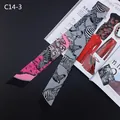 Detail of grey and pink zebra print silk scarf tied as a ribbon on fashion magazine background - Gray Pink Zebra Style (C14-3)