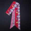 Detailed close-up of a double-sided floral satin twilly scarf for bags and hair - Red Pink Abstract Dots (C120-5)