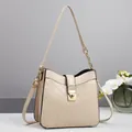 Quilted cream crossbody bag with gold chain handle and metallic lock for elegant women - Khaki