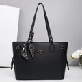 Premium black pebbled leather tote bag with silk scarf and metallic triangle logo - Black