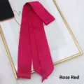 Detail of rose red satin long ribbon scarf showing smooth silk texture and sheen - 200cm / Rose Red