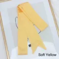 Detail of a 200cm pale yellow long skinny silk scarf with smooth satin texture finish - 200cm / Bright yellow