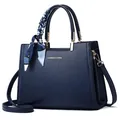 Navy blue textured leather handbag with a patterned silk scarf and gold hardware - Sapphire Blue