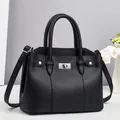 Elegant black litchi pattern leather handbag with silver hardware and shoulder strap - Black
