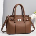 Classic lychee pattern tote bag in caramel brown with silver metal lock and top handles - Brown