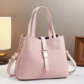 Pink large capacity crossbody bucket bag with twill embossing and gold hardware - Pink