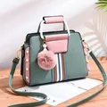 Retro green and pink contrast PU leather handbag with plush ball and striped ribbon - Mint Green