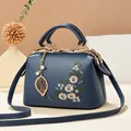 Dark blue vintage floral embroidered handbag with golden hardware and leaf pendant charm - 24*12*15CM / Dark Blue