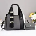 Sac à main bicolore en patchwork avec détails dorés et petite pochette assortie - Sac à main et portefeuille / Noir