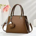 Brown lychee leather tote bag with double handles and detachable strap for daily work - Dark Khaki