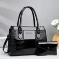 Set borse nere a tre pezzi con motivo a coccodrillo in pelle verniciata e tracolla - 31x13x23cm / Nero