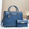 Detailed set of textured blue PU leather tote bag with matching long wallet and gold hardware - Blue / L28 W11 H22