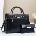 Black leather tote bag and wallet set with stylish golden ring handles and hardware - Black / L28 W11 H22