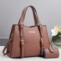 Dusty pink pebble leather tote bag set with matching small pouch and gold hardware details - Pink