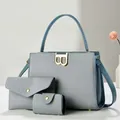 Three-piece blue textured handbag set with metal B-buckle and matching envelope bags - Blue